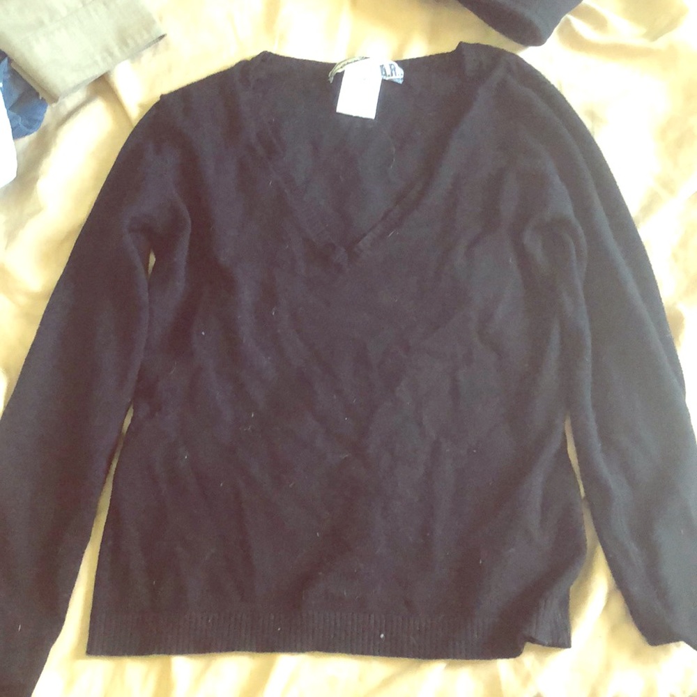 Beautiful light by Block and V neck  sweater.